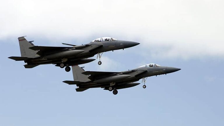 Two F15 fighter jets in the air